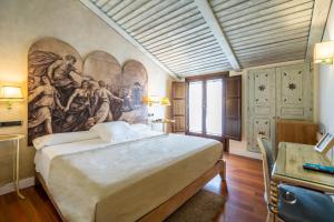 Cama o camas de una habitación en YIT La Casona del Arco