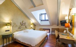 Cama o camas de una habitación en YIT La Casona del Arco