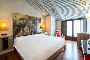Cama o camas de una habitación en YIT La Casona del Arco