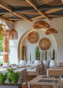 A restaurant or other place to eat at Rixos Premium Göcek - Adult Only