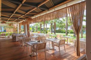 A restaurant or other place to eat at Rixos Premium Göcek - Adult Only