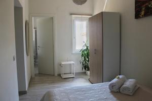Postel nebo postele na pokoji v ubytování Vesuvio House appartamento indipendente e centrale