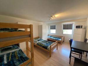 Postel nebo postele na pokoji v ubytování Hostel Airport