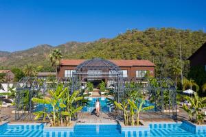 The swimming pool at or close to Rixos Premium Göcek - Adult Only