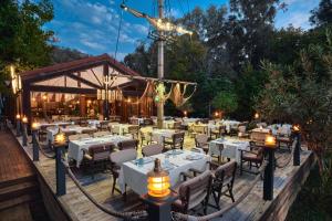 A restaurant or other place to eat at Rixos Premium Göcek - Adult Only
