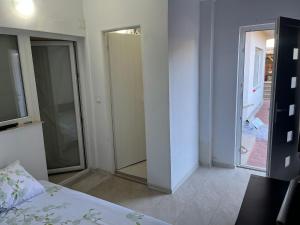 Postel nebo postele na pokoji v ubytování Casa Vio parter