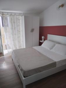 Postel nebo postele na pokoji v ubytování Casa sulla Punta