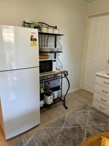 A kitchen or kitchenette at Affordable Inn