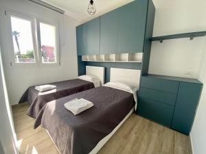 Llit o llits en una habitació de Villa Portofino by Sicilvill