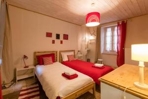 Postel nebo postele na pokoji v ubytování Cocon Familial - Gîte De Charme
