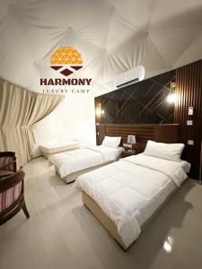 Postel nebo postele na pokoji v ubytování Harmony Luxury Camp