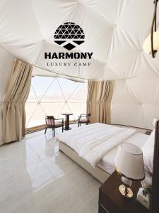 Postel nebo postele na pokoji v ubytování Harmony Luxury Camp