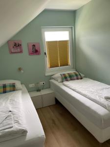 Ein Bett oder Betten in einem Zimmer der Unterkunft Haus Kleinbichler