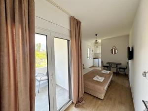 Postel nebo postele na pokoji v ubytování Danin apartmani