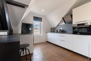 Η κουζίνα ή μικρή κουζίνα στο Les suites locarno