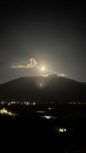 a view of the sun setting over a mountain at Welcome home in Kukës