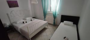 Posteľ alebo postele v izbe v ubytovaní Apartments Mony