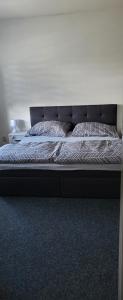 Postel nebo postele na pokoji v ubytování Apartmán U Radka