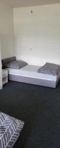 Postel nebo postele na pokoji v ubytování Apartmán U Radka