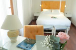Łóżko lub łóżka w pokoju w obiekcie Hotel Rural Spa Don Juan de Austria