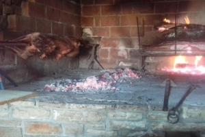 a turkey is cooking in a brick oven at Apartments Belvedere - A1 in Nečujam