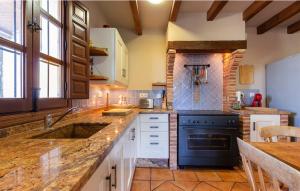 Kuchyň nebo kuchyňský kout v ubytování Casa La Rosa
