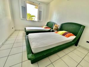 Ліжко або ліжка в номері VILLA PASKEDRA