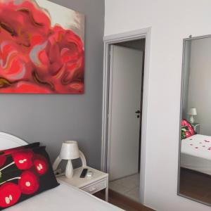 Postel nebo postele na pokoji v ubytování B&B Al Melograno