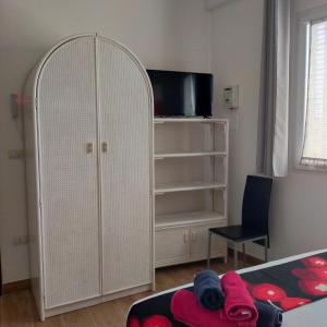 TV a/nebo společenská místnost v ubytování B&B Al Melograno