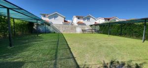 Um jardim em Apartmani Vila Milaris