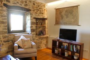 TV a/nebo společenská místnost v ubytování MONELLS - CASA Rural - CAN FELIP