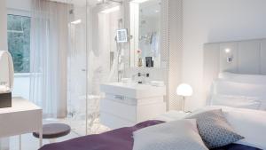 Cama ou camas em um quarto em Park Hotel Vitznau