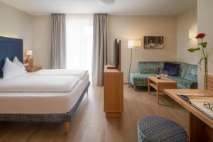 Postel nebo postele na pokoji v ubytování Villa Bavaria