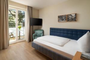 Postel nebo postele na pokoji v ubytování Villa Bavaria