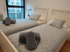 Postel nebo postele na pokoji v ubytování Home Sweet Home Pamplona Hospitales-Universidad