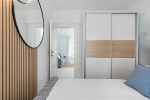 Postel nebo postele na pokoji v ubytování Apartments Marina