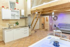 Kuchyň nebo kuchyňský kout v ubytování Suite16 & spa