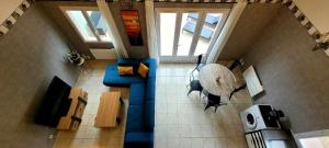 an overhead view of a living room with a table and chairs at Entre Ciel et Verdon in Castellane