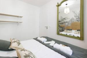 Beau T2 avec terrasse Vue mer客房内的一张或多张床位