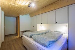 Postel nebo postele na pokoji v ubytování Superbe appartement, en 2 parties, au centre d'Anzère