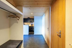 Kuchyň nebo kuchyňský kout v ubytování Superbe appartement, en 2 parties, au centre d'Anzère