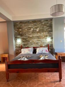 Postel nebo postele na pokoji v ubytování Apartments Sunpoint