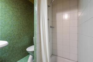 Koupelna v ubytování Superbe appartement, en 2 parties, au centre d'Anzère