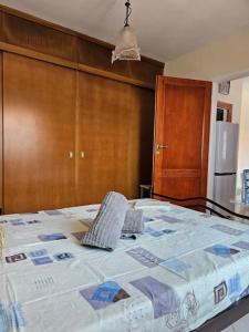 a large bed in a room with at Athene place 1 in Rodhiá