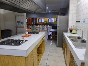 Kuchyň nebo kuchyňský kout v ubytování Hostel Cienfuegos