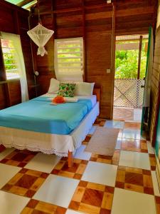 Letto o letti in una camera di Le Petit Paradis