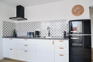 Kuchyň nebo kuchyňský kout v ubytování Vineyard Terrace Apartment