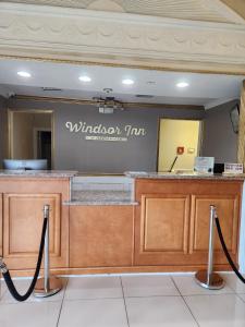 Lobby alebo recepcia v ubytovaní Windsor Inn of Jacksonville