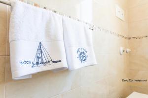 Ванная комната в Palm Beach House - Vista mare +34 фотографии