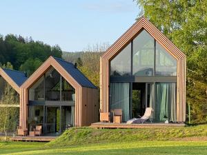 En have udenfor Domki Pod Lasem - Domek Sosnowy